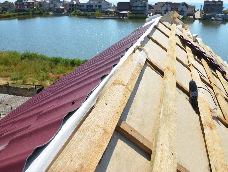 Metal roof replacement is needed signs