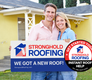 Happy homeowners holding a Strong Hold Roofing sign in Central Florida